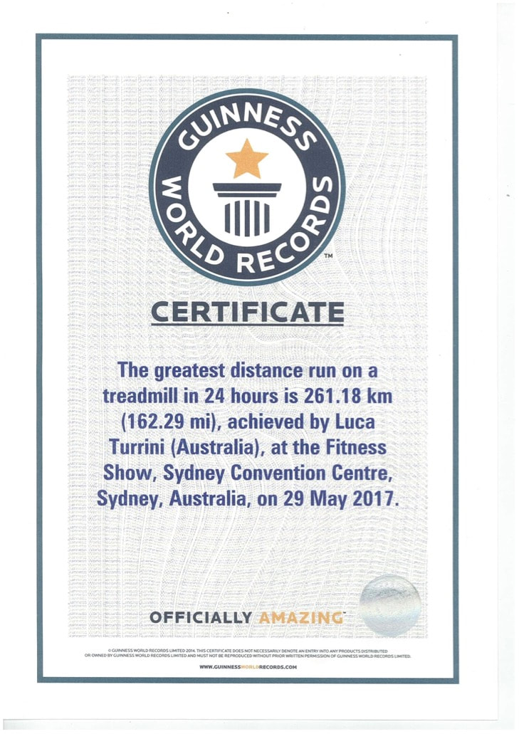 Luca receives the Guinness World Record certificate for 24 hours on treadmill 